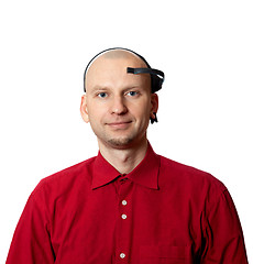 Image showing Portrait of young man with EEG (electroencephalography) headset 