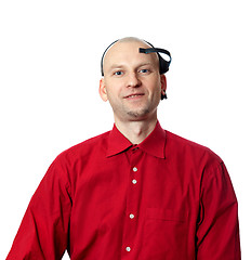 Image showing Portrait of young man in red shirt with EEG headset on head