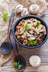 Image showing Traditional Russian food: buckwheat with mushrooms and onions.