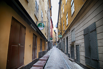 Image showing STOCKHOLM, SWEDEN - AUGUST 20, 2016: View of narrow street and c