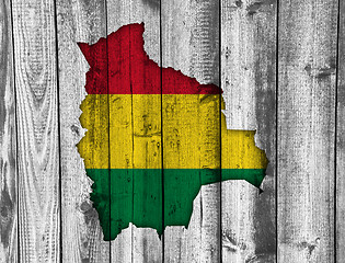 Image showing Map and flag of Bolivia on weathered wood