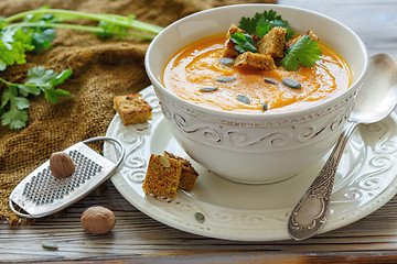 Image showing Pumpkin soup with croutons and spices.