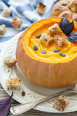 Image showing Pumpkin soup with croutons in a pumpkin.