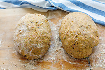 Image showing Preparing dough for baking homemade pumpkin bread.