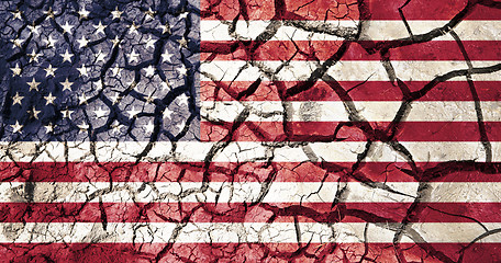 Image showing american flag on cracked ground background