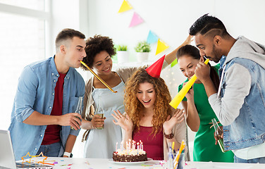 Image showing team greeting colleague at office birthday party