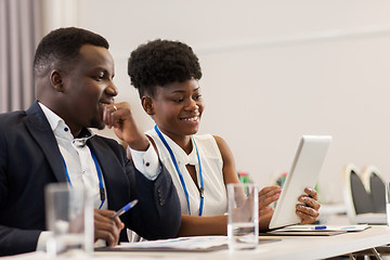 Image showing team with tablet pc at business conference