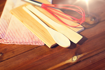 Image showing close up of cooking kitchenware on wooden board