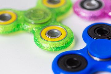 Image showing close up of fidget spinners on white background