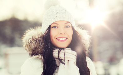 Image showing happy woman outdoors in winter clothes