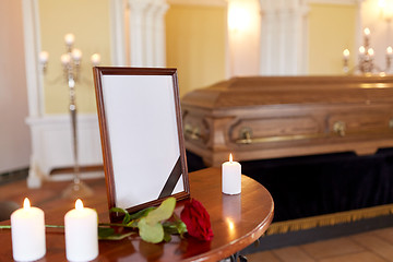 Image showing photo frame and coffin at funeral in church