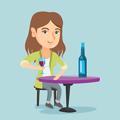 Image showing Caucasian woman drinking wine in the restaurant.