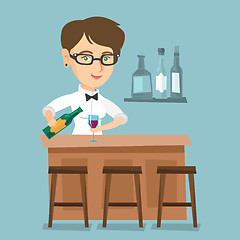 Image showing Caucasian bartender standing at the bar counter.
