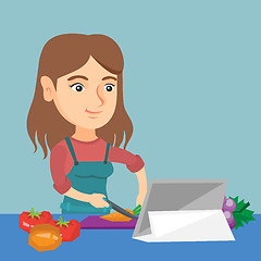 Image showing Caucasian woman cooking healthy vegetable salad.