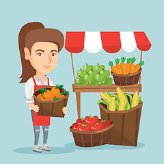 Image showing Caucasian street seller with fruits and vegetables