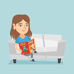 Image showing Woman sitting on the couch and reading a magazine.