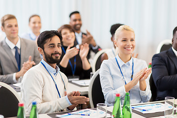 Image showing people applauding at business conference