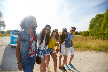 Image showing smiling happy young hippie friends at minivan car