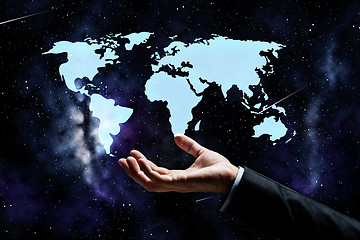 Image showing close up of businessman hand with world map