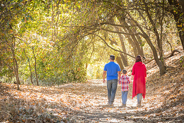 Image showing Mixed Race Caucasian and Hispanic Family Taking a Walk At The Pa