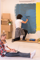 Image showing Happy couple doing home renovations