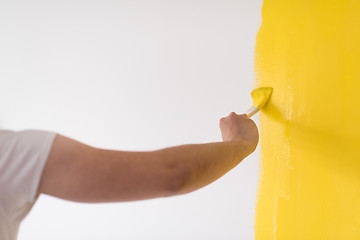 Image showing hand painting wall