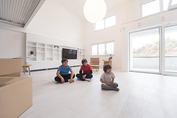 Image showing young boys having fun on the floor