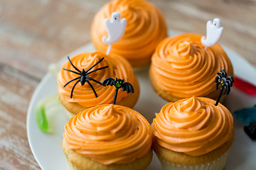 Image showing halloween party decorated cupcakes on plate