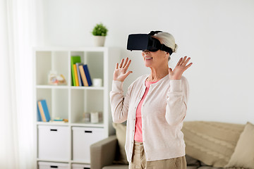 Image showing old woman in virtual reality headset or 3d glasses