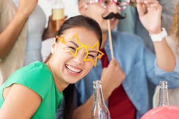 Image showing happy woman with friends having fun at party