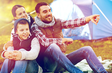 Image showing happy family with tent at camp site