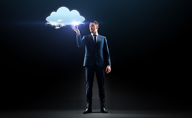 Image showing businessman working with virtual cloud hologram