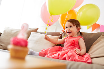 Image showing happy baby girl on birthday party at home