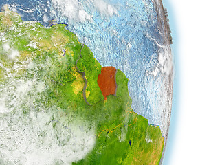 Image showing Suriname in red on Earth