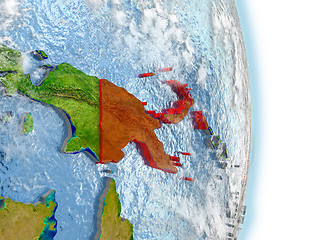 Image showing Papua New Guinea in red on Earth