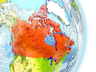 Image showing Canada in red on Earth