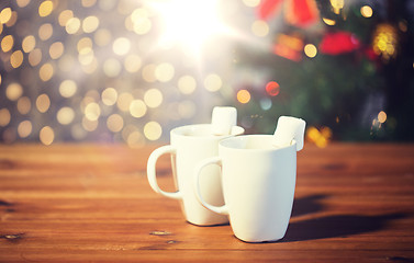 Image showing cups of hot chocolate with marshmallow on wood