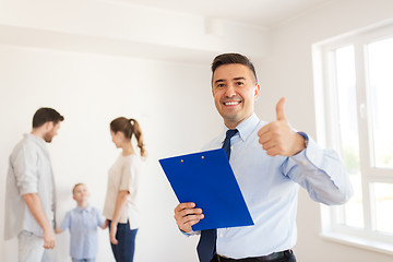 Image showing realtor with clipboard showing thumbs up