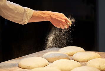 Image showing chef or baker making bread dough at bakery