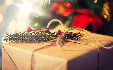 Image showing close up of christmas gift with fir brunch