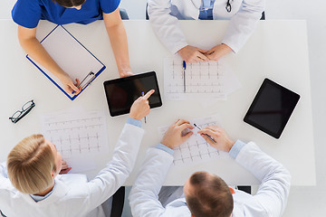 Image showing doctors with cardiogram and tablet pc at hospital