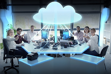 Image showing happy business team with cloud computing hologram