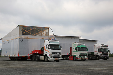 Image showing Three Oversize Load Transport Trucks