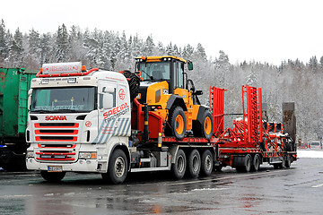 Image showing Scania Truck Hauls Heavy Machinery in Winter