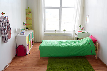 Image showing kids room interior with bed, table and accessories