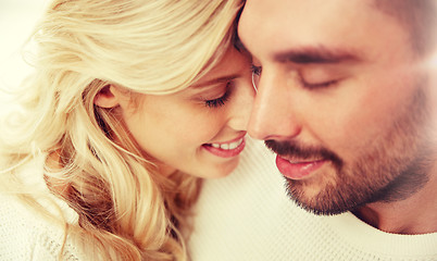 Image showing close up of happy couple faces with closed eyes