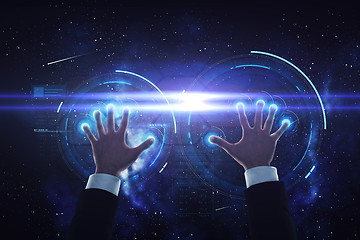 Image showing businessman hands with virtual projection