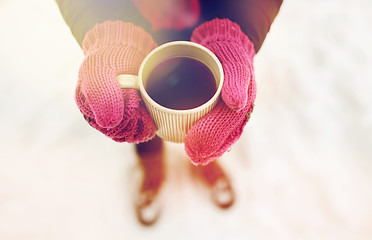 Image showing close up of woman with tea mug outdoors in winter