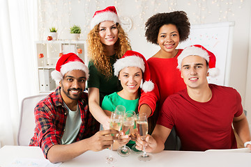 Image showing happy team celebrating christmas at office party