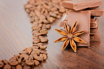 Image showing Coffee beans close up and chocolate